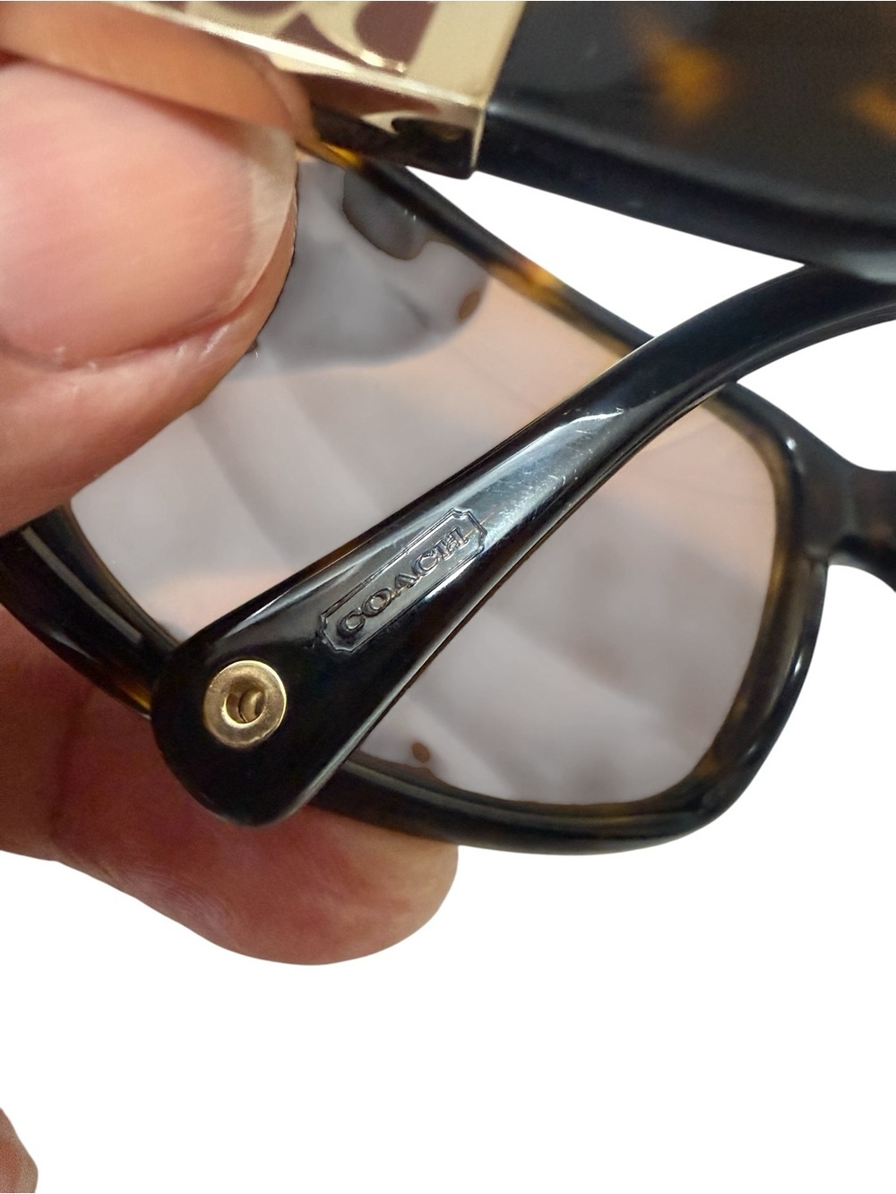 Coach Nina S494Tortoise Sunglasses featuring a dark brown tortoiseshell frame - Picture 10 of 16